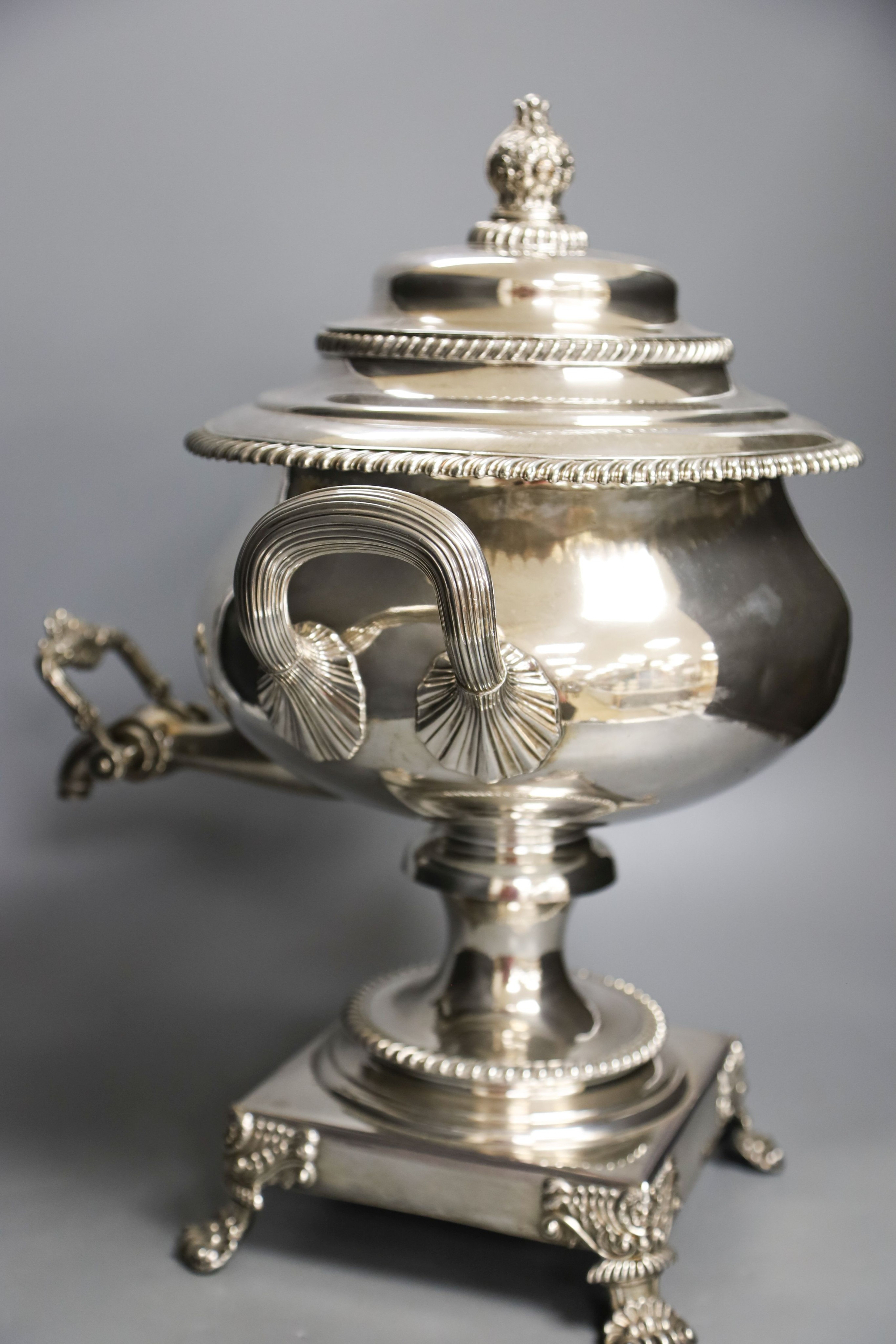 A Regency Old Sheffield Plate two handled tea urn, with spigot and side carrying handles 44cm